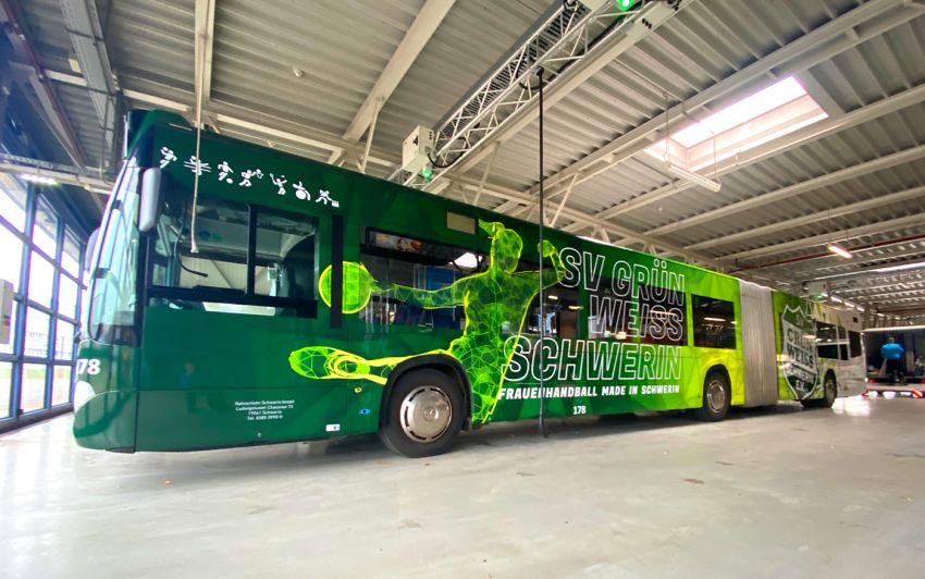 busbeklebung